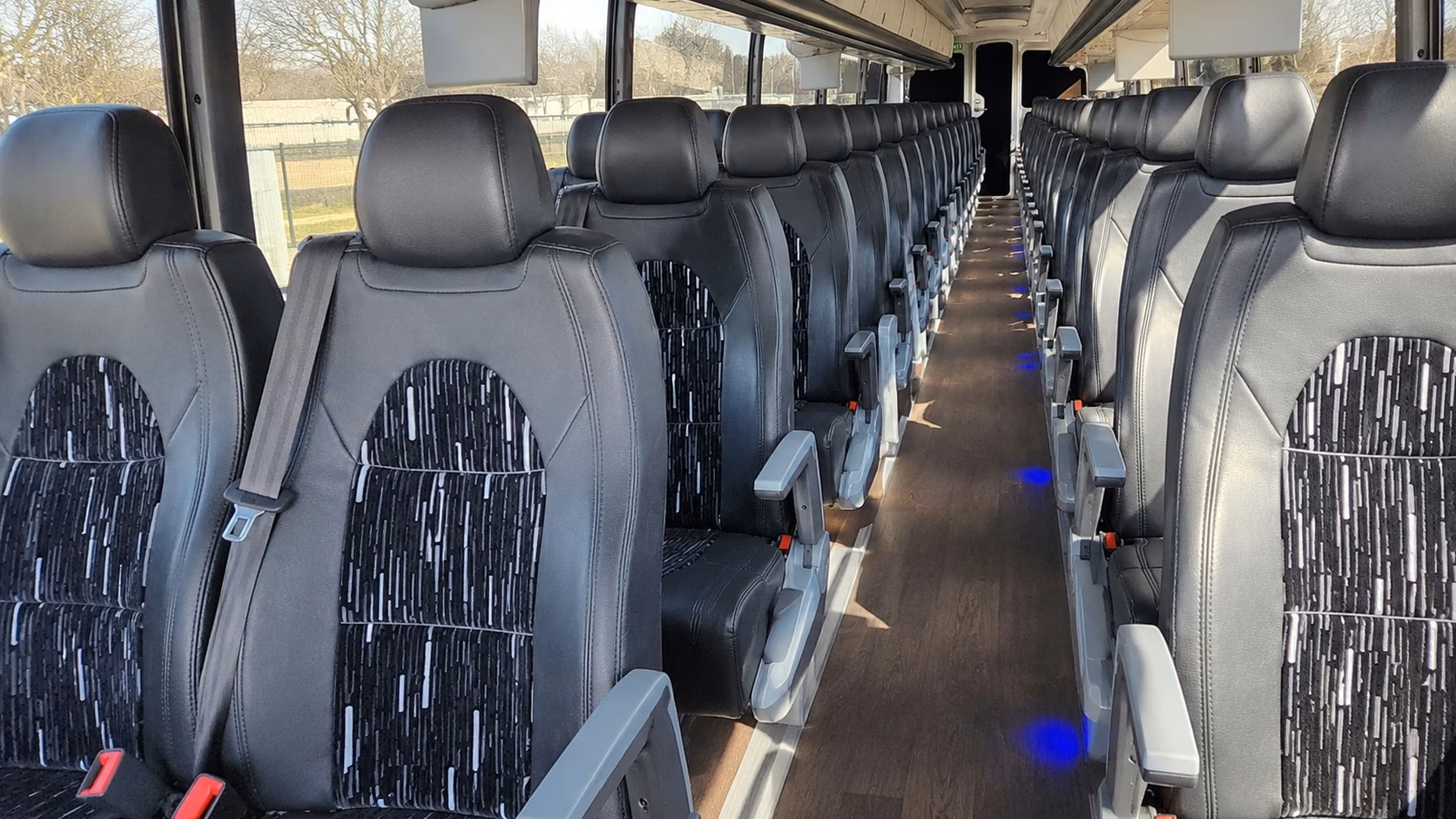 compare sporting event transportation options in lawrence and beyond